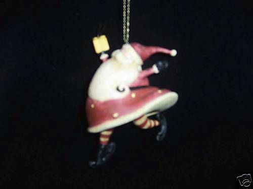 Santa On A Present August Moon Ornament  