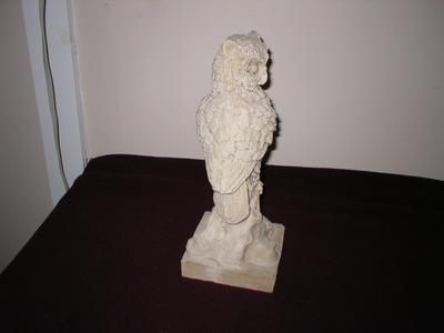  carved, alabaster, owl, figure. The owl is marked A Santani. The 