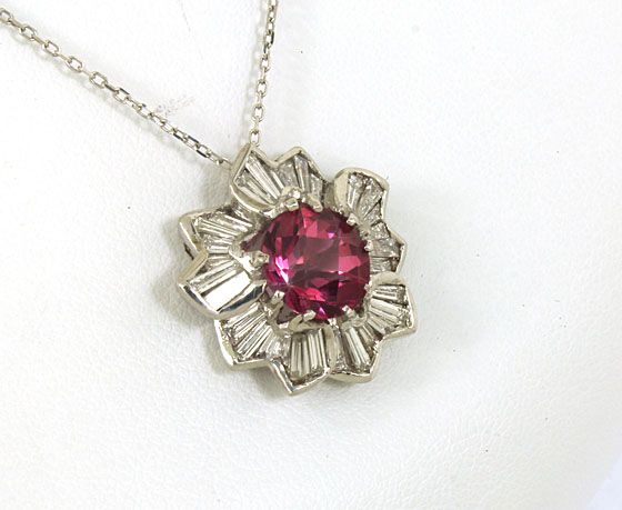 this is an opulent 14k gold diamonds and pink tourmaline ladies 