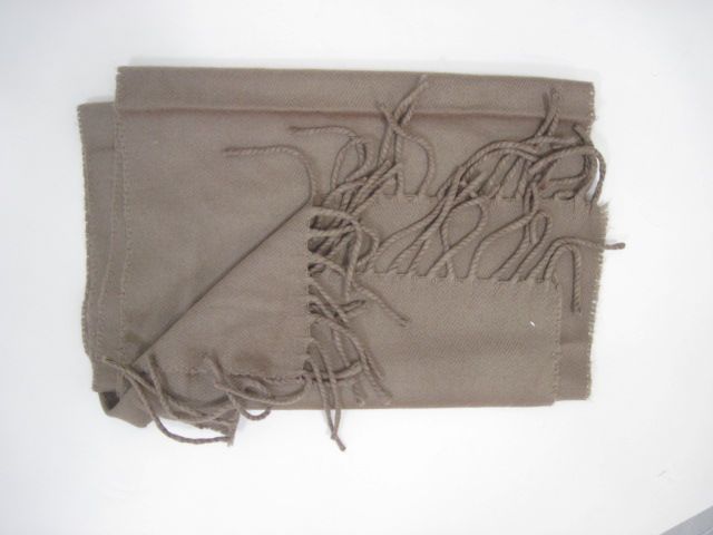   Frayed Edges. This gorgeous brown scarf is long and has a frayed edge