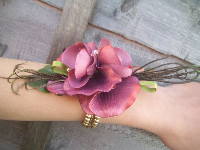 Beautiful Burgundy Bronze metallic Orchid cluster wrist corsage.