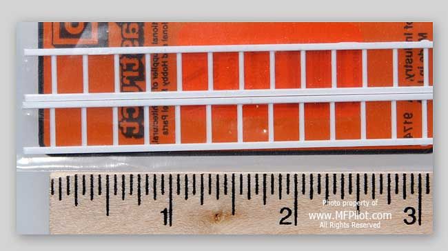 package of 2 pieces of white styrene O Scale (1/48 scale) ladders 